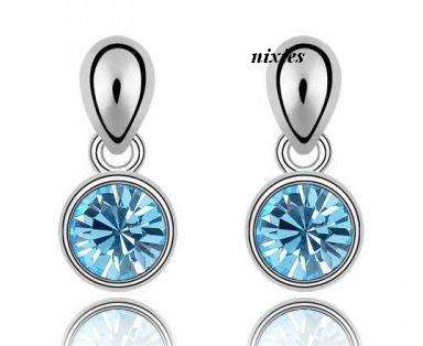 ELEGANT BLUE TOPAZ SWAROVSKI DANGLING STUDS