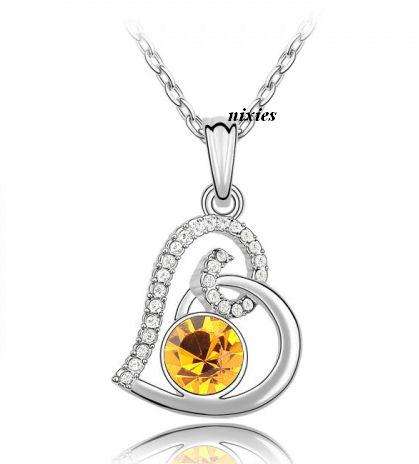 DAZZLING CITRINE SWAROVSKI  PENDANT on chain