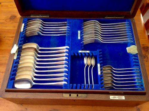 Sheffield hallmarked Walker & Hall silver incomplete cutlery set in vintage cabinet, early 20th cent