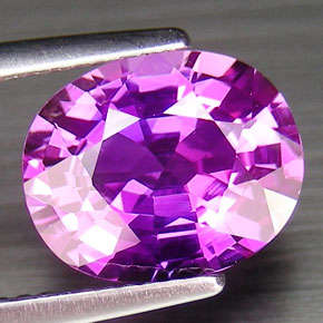 3.9 ct oval facet purple sapphire gemstone