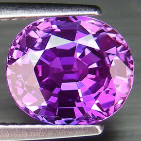 5.1 ct oval facet purple sapphire gemstone