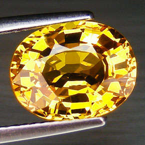 5.1 ct oval facet golden yellow sapphire gemstone