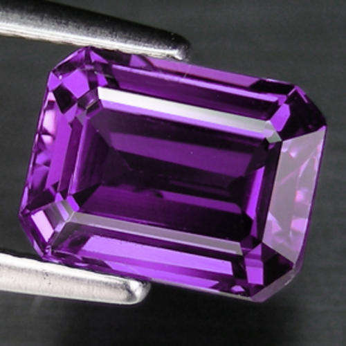 5.2 ct emerald cut purple sapphire gemstone