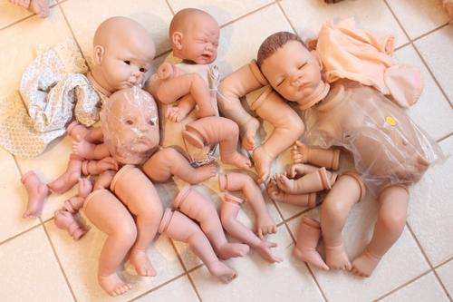 Assorted vinyl reborn heads and limbs