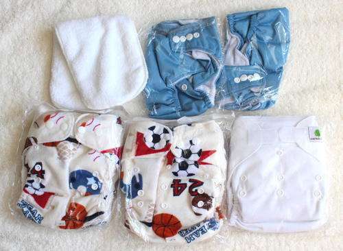 5 New Cloth nappies + 5 inserts