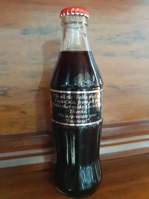 Coca-Cola sealed bottle `to all the folks that sell Coca-Cola ....`