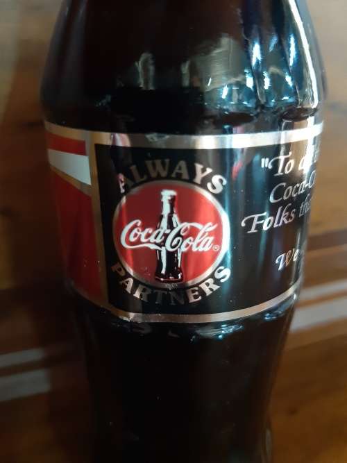 Coca-Cola sealed bottle `to all the folks that sell Coca-Cola ....`