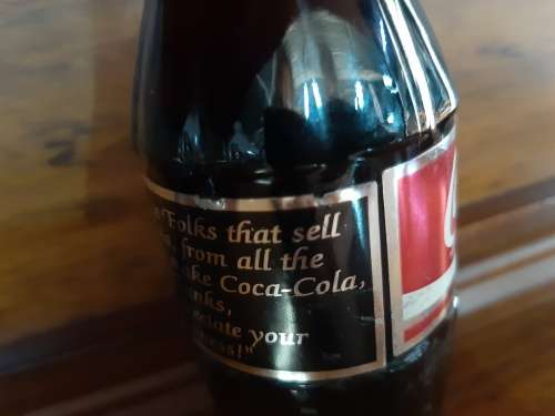 Coca-Cola sealed bottle `to all the folks that sell Coca-Cola ....`