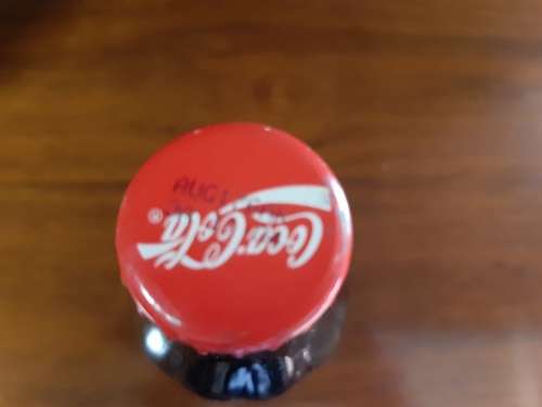 Coca-Cola sealed bottle `to all the folks that sell Coca-Cola ....`