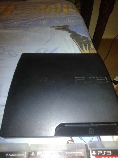 PS3 320GB WITH 10 GAMES + RED Controller