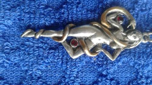 Naked Dancing Lady with Serpent Pendant 2 red swarovski crystals 5cm length with chain.