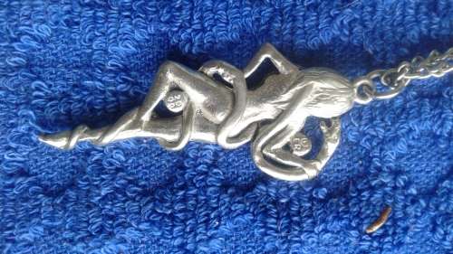 Naked Dancing Lady with Serpent Pendant 2 red swarovski crystals 5cm length with chain.