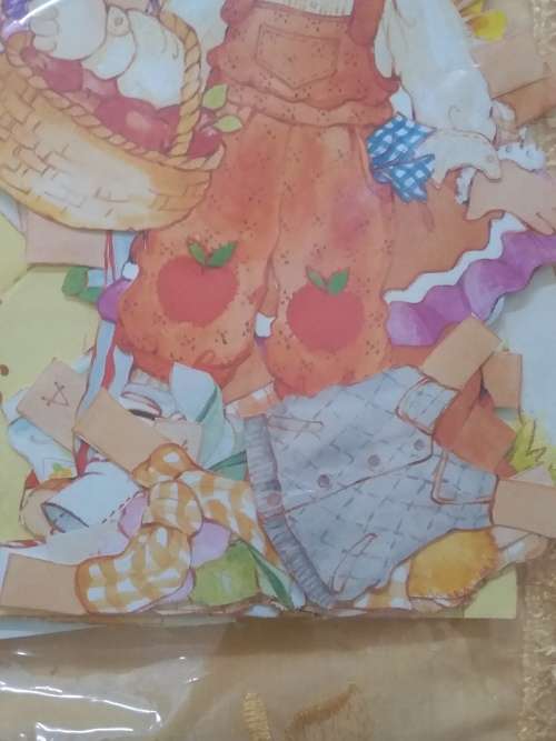 Paper Dolls with uncut and cut out clothes plus 2 new pick up sticks games - very good condition