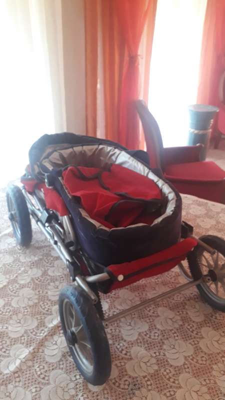 TRENDY DOLL PRAM RED/SILVER - LIKE NEW CONDITION SEE PICTURES