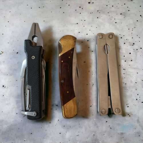 Stunning vintage collectors pocket knives two of which are multi tools with pouches