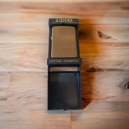 Rare collectors gold tint Zippo lighter with Benson & Hedges emblem in original casing
