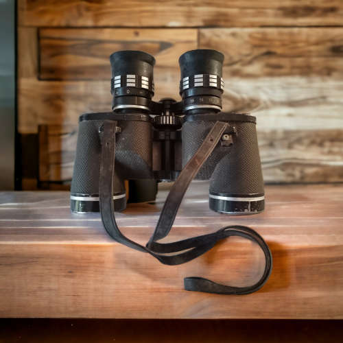Collectors binoculars with leather carry case