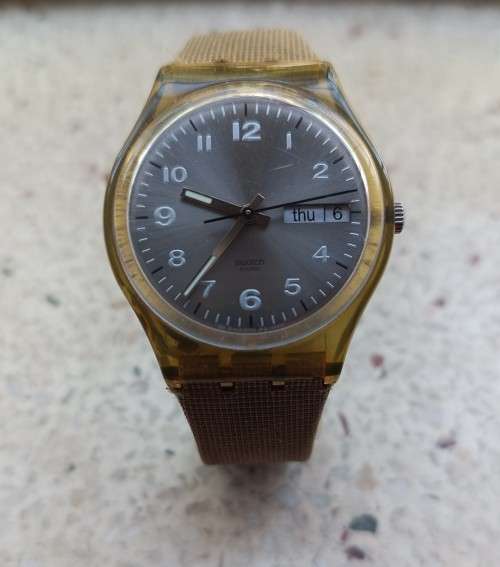 Vintage Collectors Swatch Swiss Gents Watch on beige canvas strap Value R2250.00