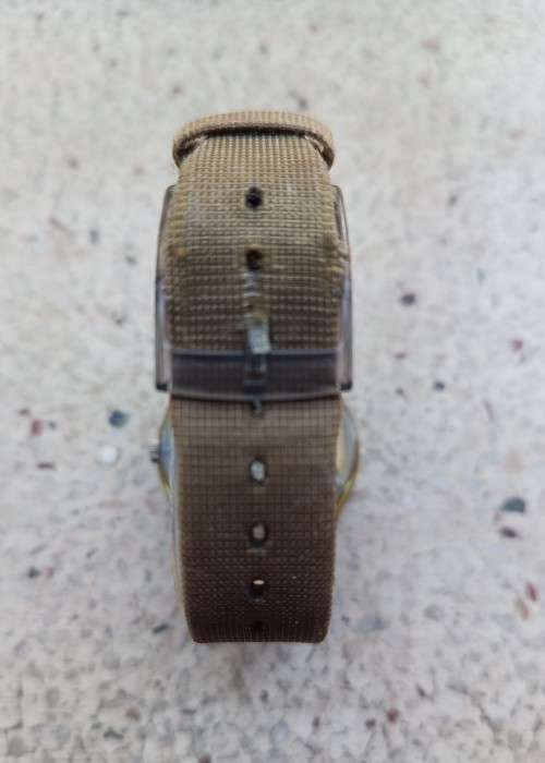 Vintage Collectors Swatch Swiss Gents Watch on beige canvas strap Value R2250.00