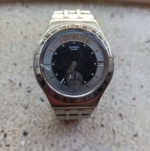 Vintage Collectors Swatch Swiss Gents Watch with black and silver dial Value R2250.00