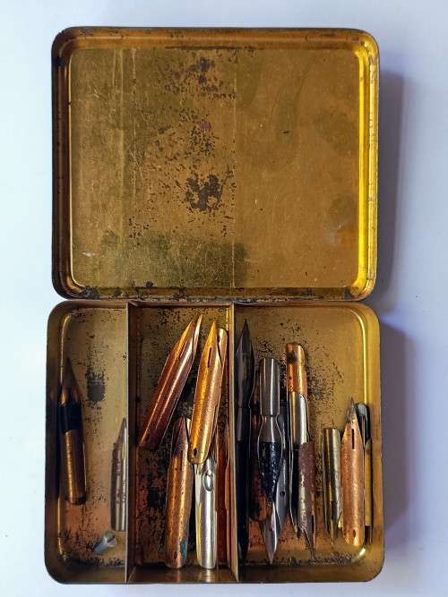 Vintage Collectors selection comprising of maths set, leather like folder & fountain pen nibs