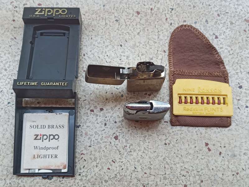 Collectors Benson & Hedges Zippo lighter and additional lighter and Ronson Redskin Flints NJ