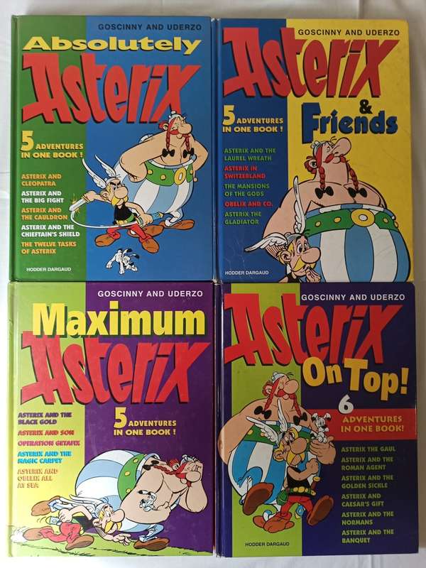 Four Collectors Hard cover Asterix books with multiple adventures in each book