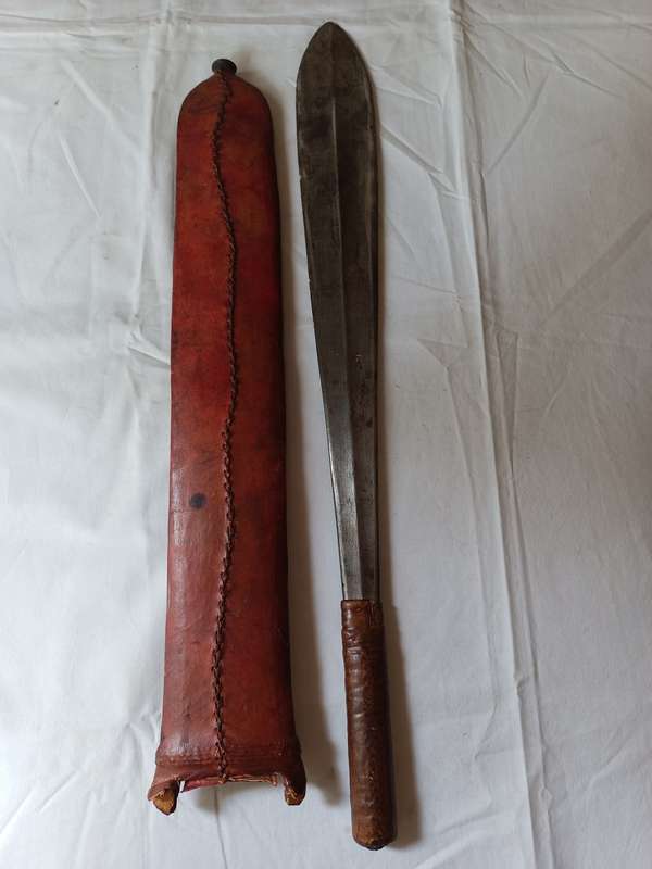 Collectors machete with sheath with loop for belt