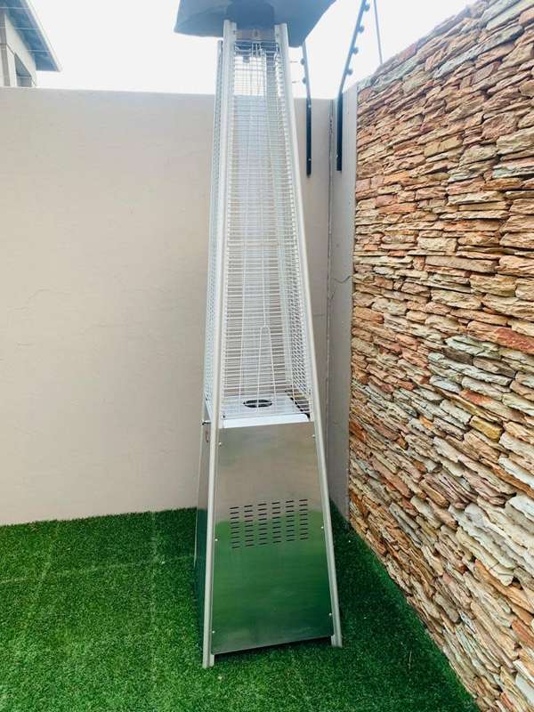 Totai Stainless Steel Patio Heater on wheels and a 9kg Gas bottle