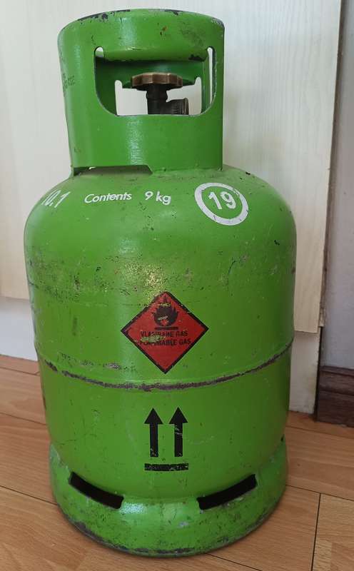 Totai Stainless Steel Patio Heater on wheels and a 9kg Gas bottle