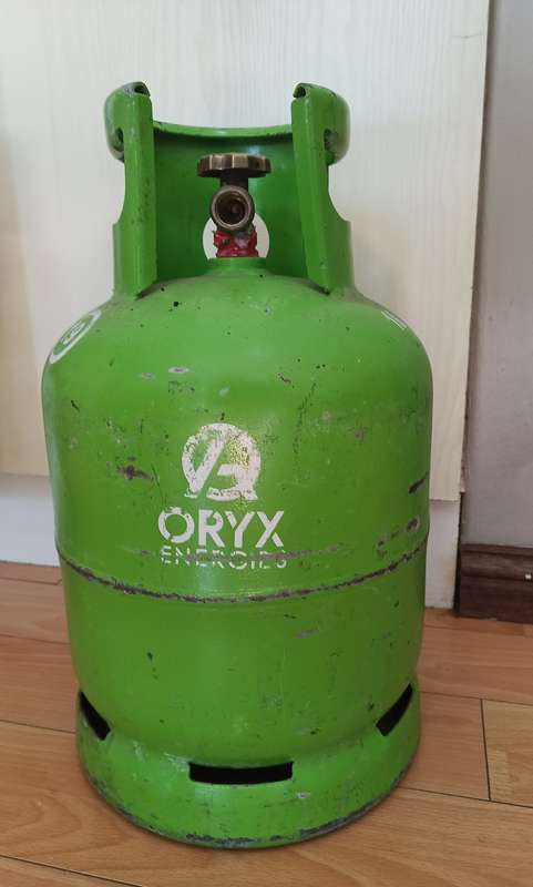 Totai Stainless Steel Patio Heater on wheels and a 9kg Gas bottle