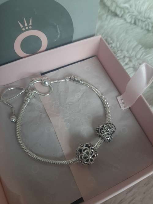 PANDORA ADJUSTABLE BRACELET WITH CHARMS