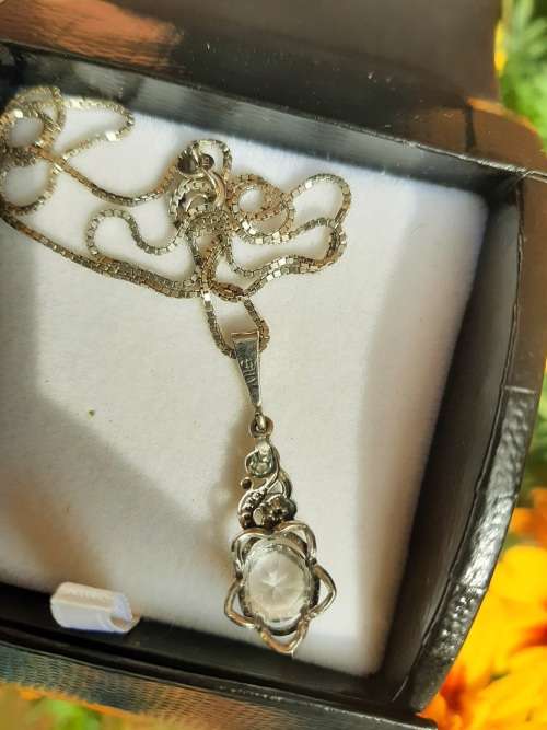 ANTIQUE STERLING SILVER CUT DESIGN PENDANT WITH STONE