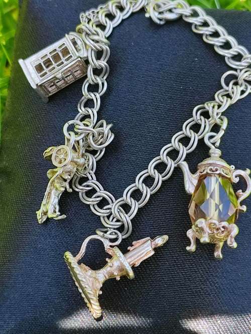 RARE STERLING CHARMS BRACELET