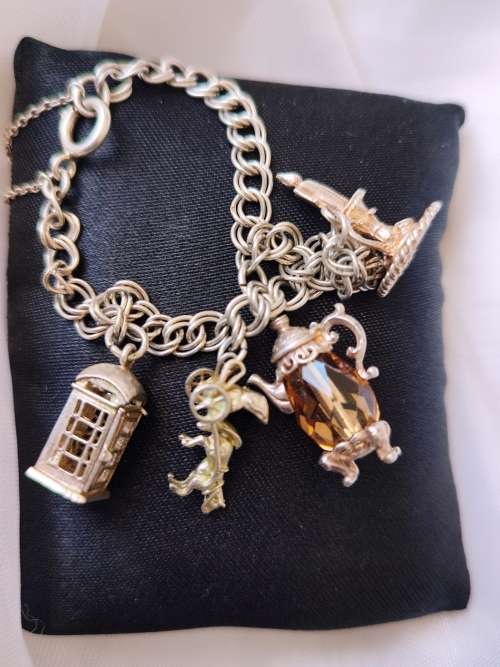 RARE STERLING CHARMS BRACELET