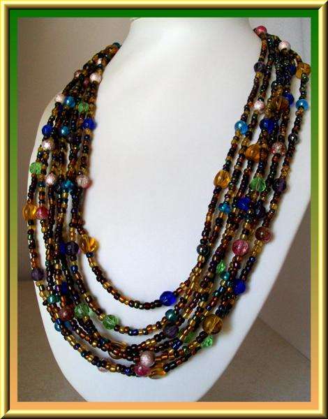 Pretty colourful multi strand necklace .