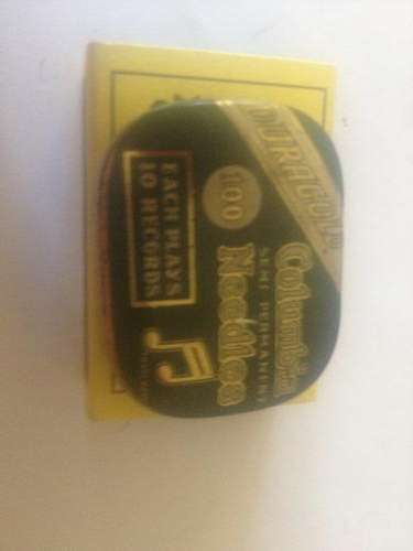 Old grammaphone needles in tin