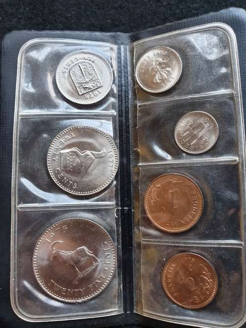 SET OF COINS OF RHODESIA  ** SIX UNCIRCULATED COINS IN PLASTIC FOLDER**