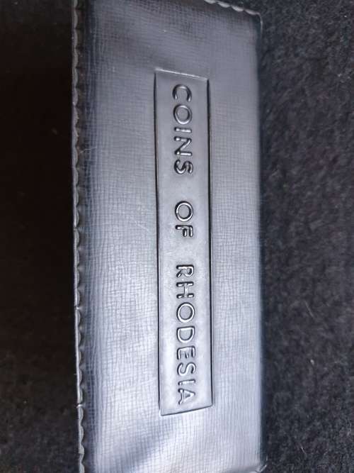 SET OF COINS OF RHODESIA  ** SIX UNCIRCULATED COINS IN PLASTIC FOLDER**