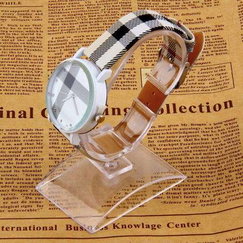Timless Classic - The Strap shows a  Burberry Plaid Style Pattern - Ladies Quartz Watch