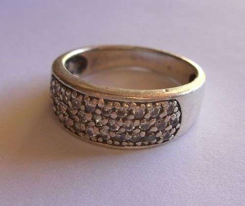 Stunning Sterling Silver Ring, Heavy with lots of faceted clear stones