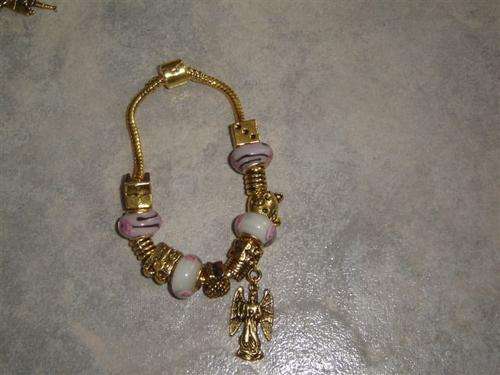 FREE SHIPPING!! Must have   PANDORA Bracelet, Gold