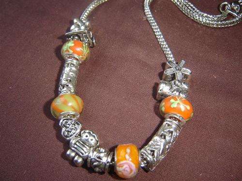 SPECIAL Must have PANDORA Necklace with 13 stunning beads in orange