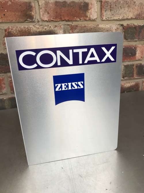 Storage book with Zeiss / Contax stickers,  material: aluminium and plastic/wood ?