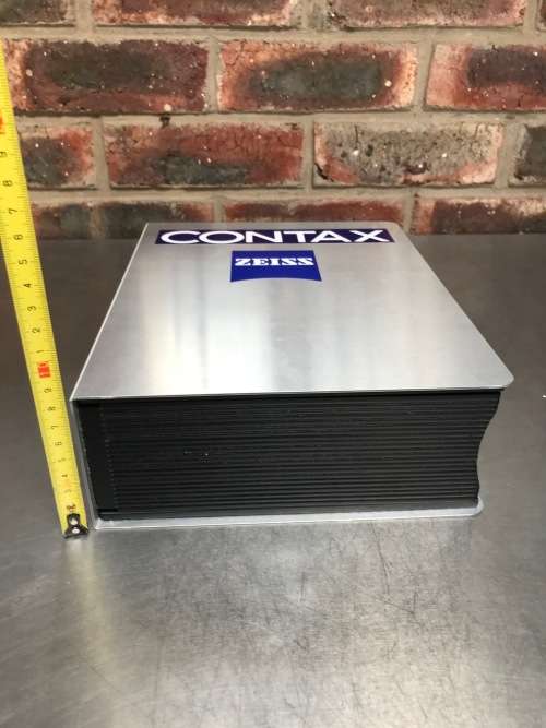 Storage book with Zeiss / Contax stickers,  material: aluminium and plastic/wood ?