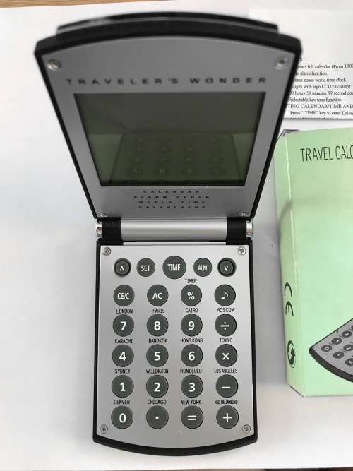 Travel Calculator Calendar Alarm Watch , with new battery, vintage