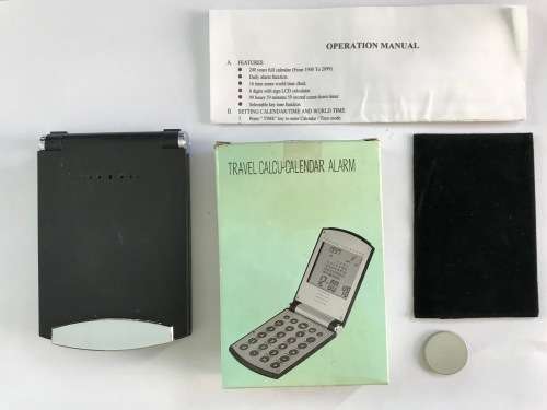 Travel Calculator Calendar Alarm Watch , with new battery, vintage