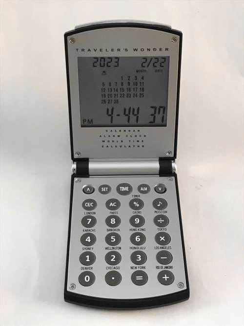 Travel Calculator Calendar Alarm Watch , with new battery, vintage