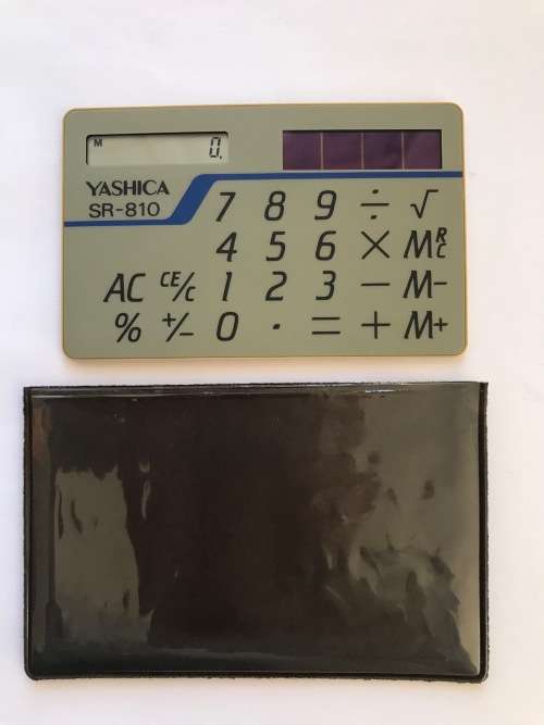 Kyocera Electronic Calculator Solar Power Yashica SR-810, card type, made in Japan, collectors item