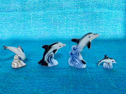 Porcelain dolphins (4) vintage, approx.from the  80s, collection item,